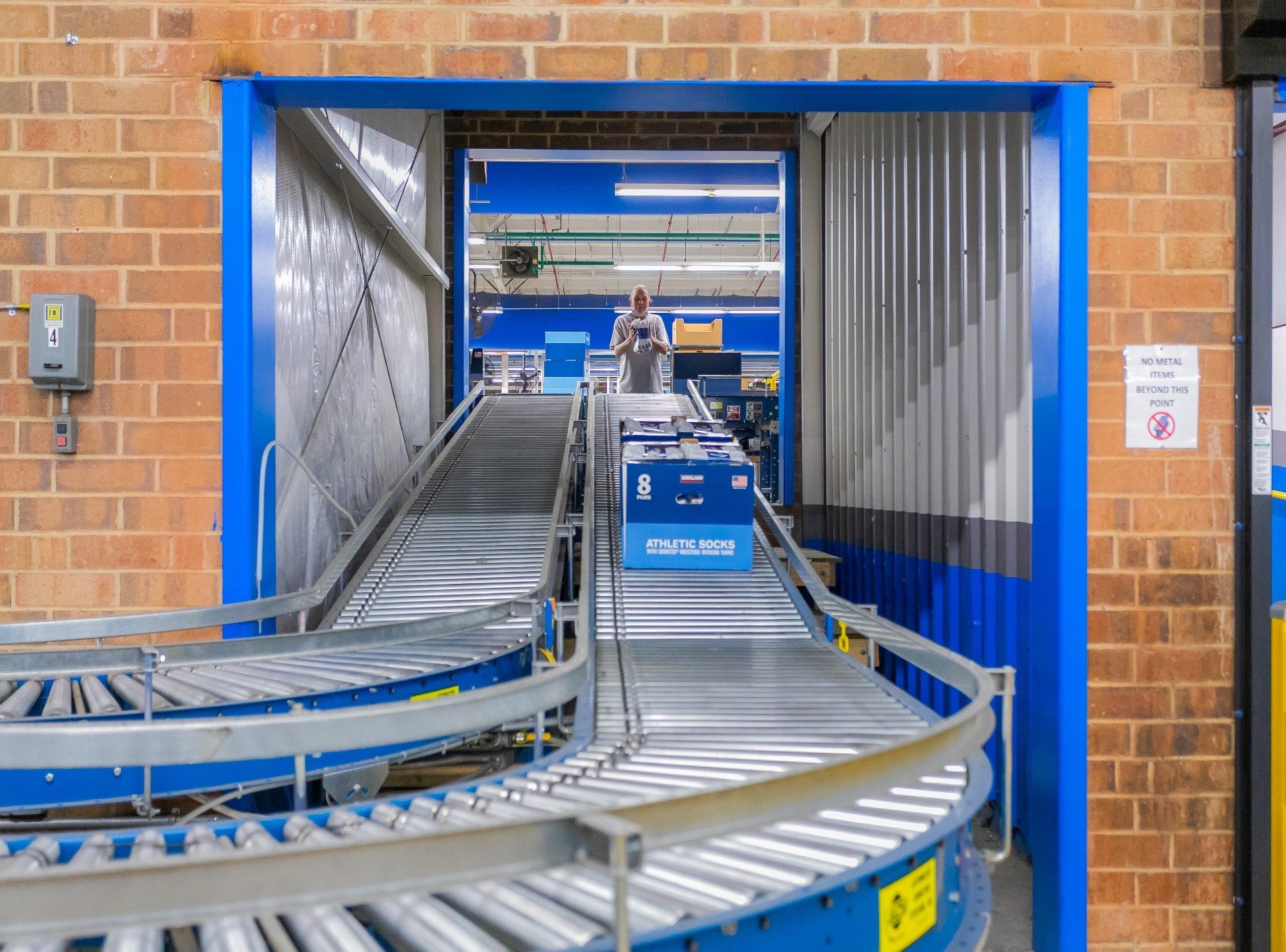 The conveyor belt that moves product from our finishing department into the warehouse.